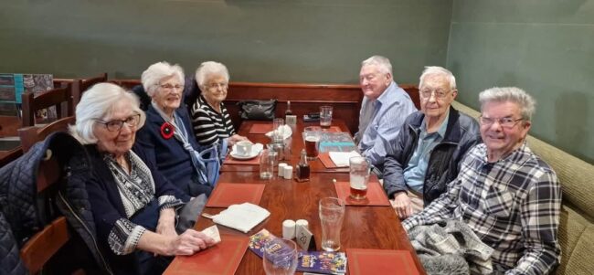 Residents from Humberston House Care Home enjoying a social outing together at a local pub.